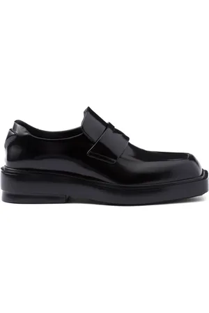 Prada Triangle-patch leather loafers