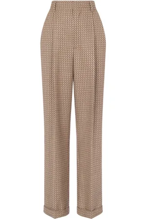 Moschino Geometric-print virgin-wool trousers