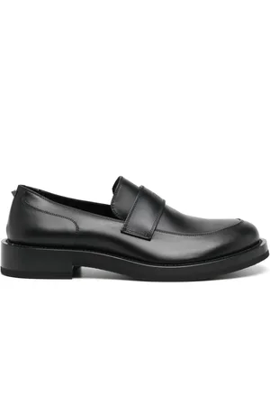VALENTINO GARAVANI Logo-debossed leather loafers