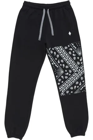 MARCELO BURLON Bandana-print panelled cotton track pants