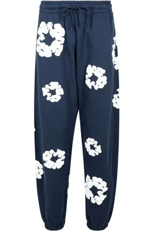 DENIM TEARS Cotton Wreath-print track pants