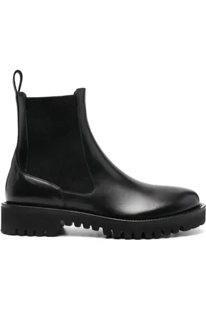 VALENTINO GARAVANI Toile Iconographe leather boots