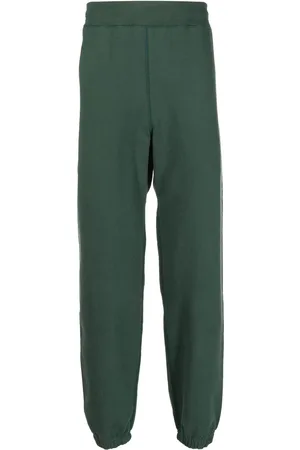SUICOKE Logo-print cotton track pants