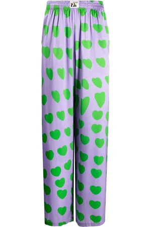 Natasha Zinko Heart-print flared-trousers