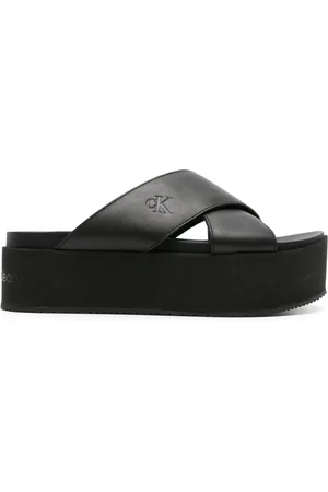 Calvin Klein Logo-debossed flatform slides