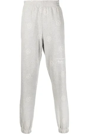 MARTINE ROSE Logo pattern track pants