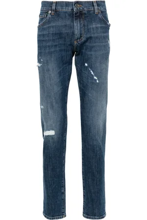 Dolce & Gabbana Ripped-detail tapered jeans