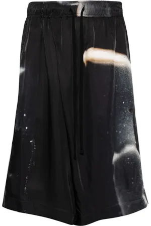 JULIUS Graphic-print bermuda shorts