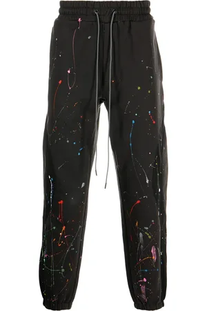 MOSTLY HEARD RARELY SEEN Paint-splattered tapered joggers