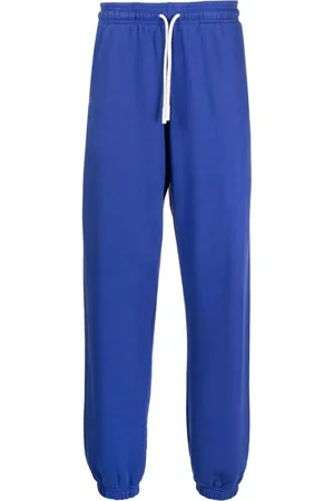 MARCELO BURLON Cross tapered track pants