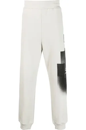 A-cold-wall* Brutalist logo-print track pants