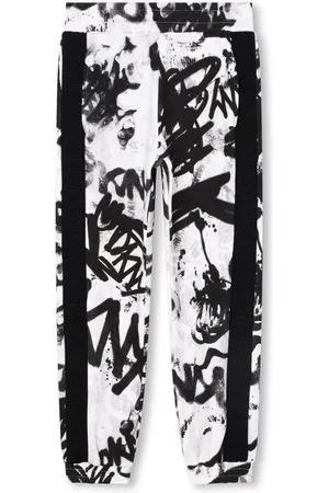 DKNY Logo-tape graffiti-print trousers