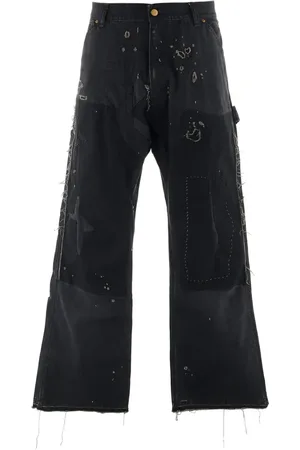 SAINT MXXXXXX Distressed wide-leg jeans