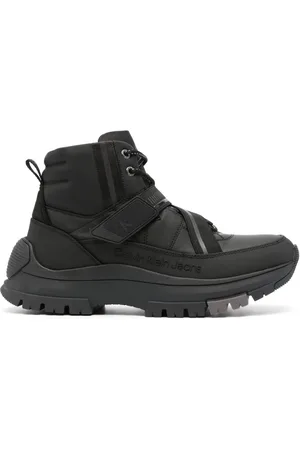 Calvin Klein Logo-embossed leather ankle boots