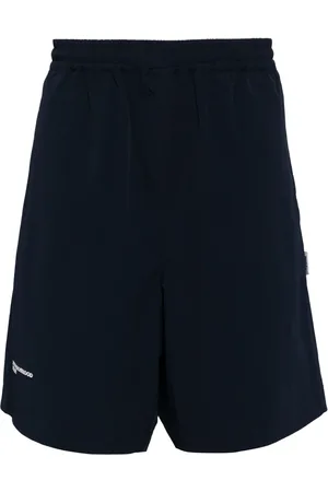 Izzue X Neighborhood logo-tag track shorts