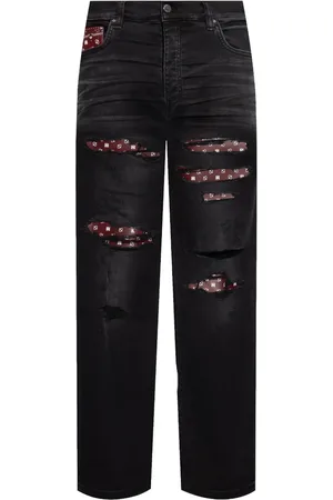 AMIRI Distressed bandana-detail jeans