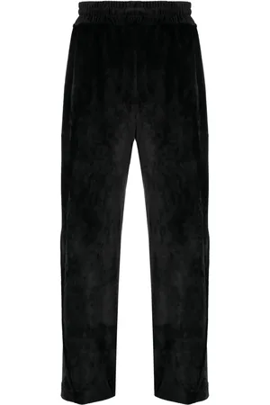GCDS Logo-embroidered velvet trousers