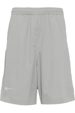 Izzue X Neighborhood logo-tag track shorts