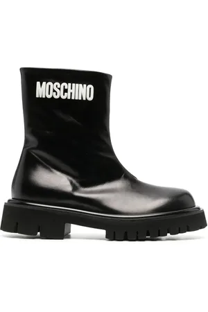 Moschino Embossed-logo zipped leather boots