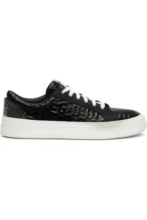 GCDS Patent-monogram sneakers