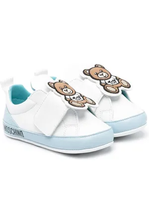 Moschino Logo-patch sheepskin sneakers
