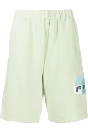 UNDERCOVER House print wide-leg shorts