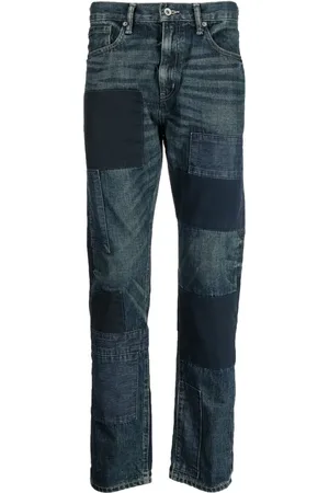 NEIGHBORHOOD Patch-detail washed-denim jeans