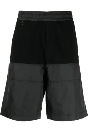 UNDERCOVER Panelled-design elasticated-waistband track shorts