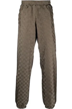 MISBHV Monogram-pattern trackpants