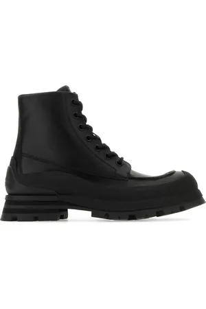 Alexander McQueen Logo-embossed leather combat boots