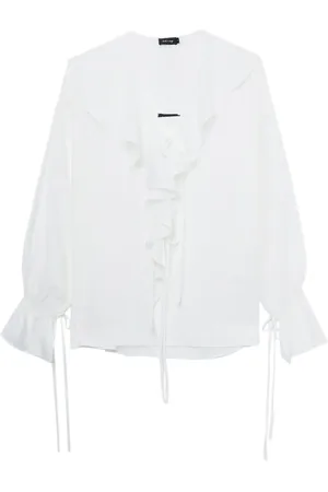 tout a coup Lace-up ruffled blouse