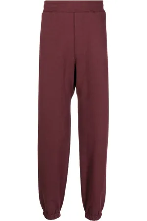 SUICOKE Logo-print cotton track pants