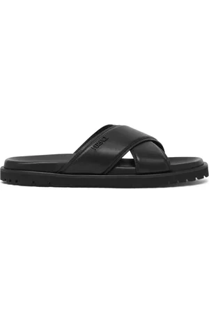 VERSACE Logo-lettering leather slides