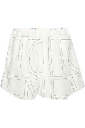 Totême Monogram-embroidered shorts