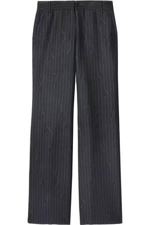 OFF-WHITE Pinstripe-pattern virgin wool-blend trousers