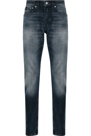 Calvin Klein Mid-rise tapered-leg jeans