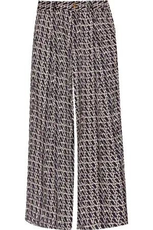 AERON Wellen monogram-print trousers