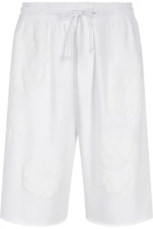 DENIM TEARS Mono Cotton Wreath-print shorts