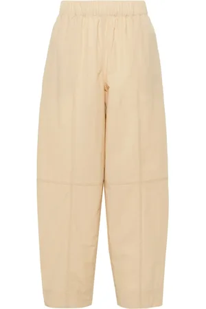 Ganni Curve tapered-leg trousers