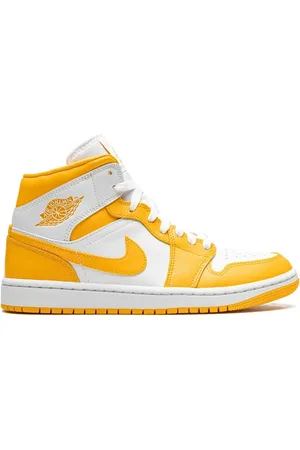 Jordan 1 Mid "White/University Gold" sneakers