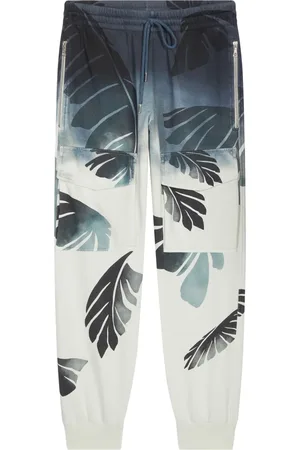 DRIES VAN NOTEN Palm-printed trousers