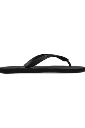 Vetements Embossed logo flip flops