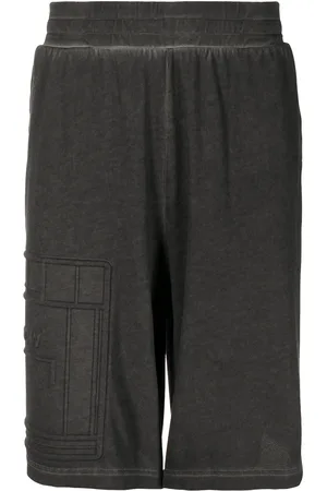 A-cold-wall* Debossed-logo elasticated-waist Bermuda shorts