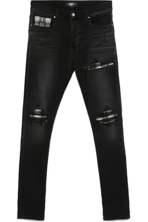 AMIRI Ripped-detailing jeans