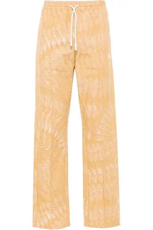 MARCELO BURLON AOP Feather straight-leg trousers