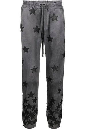 AMIRI Star pattern gradient track trousers
