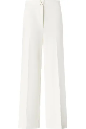 GENNY Cross-detail trousers