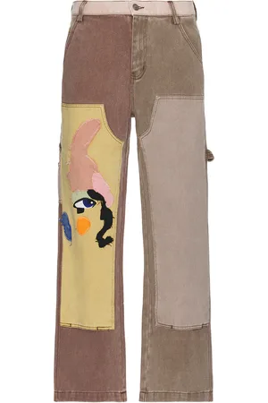 KIDSUPER STUDIOS Patchwork Face Double Knee Pants in