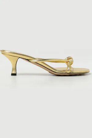 Bottega Veneta Blink mules in laminated leather