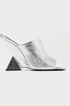 The Attico Cheope mules in laminated leather